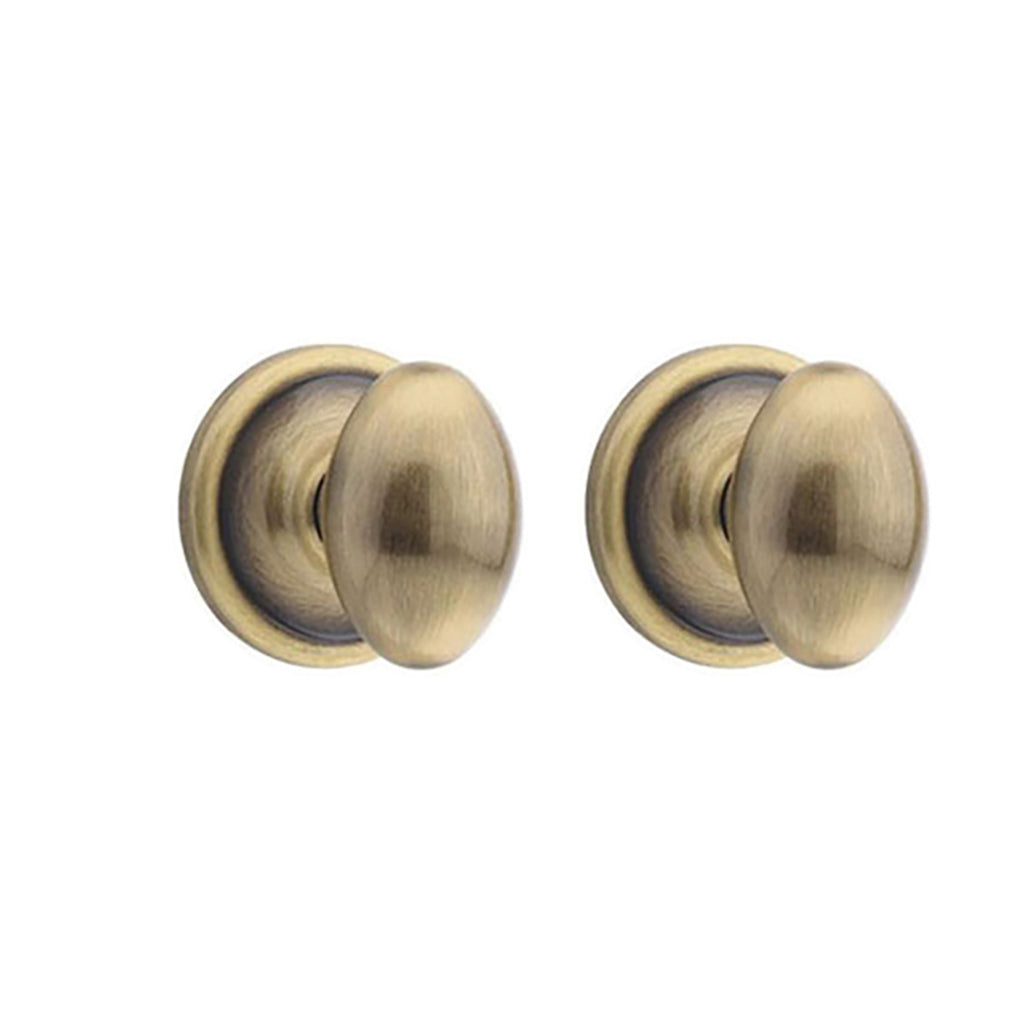 Kwikset Windham US5 732 W Dummy Egg Knob Pair - Antique Brass - Kwikset Windham US5 732 W Dummy Egg Knob Pair - Antique Brass