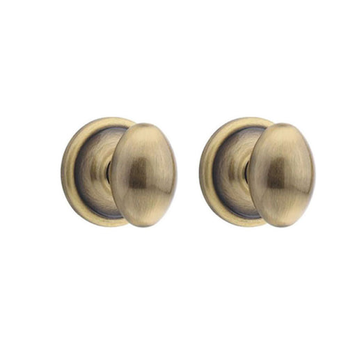 Kwikset Windham US5 732 W Dummy Egg Knob Pair - Antique Brass - Kwikset Windham US5 732 W Dummy Egg Knob Pair - Antique Brass
